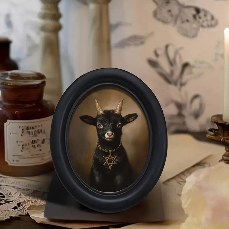 Black The Dark Arts: Dapper Goat with Black, oval framed dapper looking goat. Wooden frame in a gothic alternative style.
