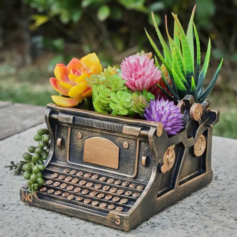 Typewriter Planter with Shaped pot plant holder/planter. Plastic resin in a gothic alternative style.