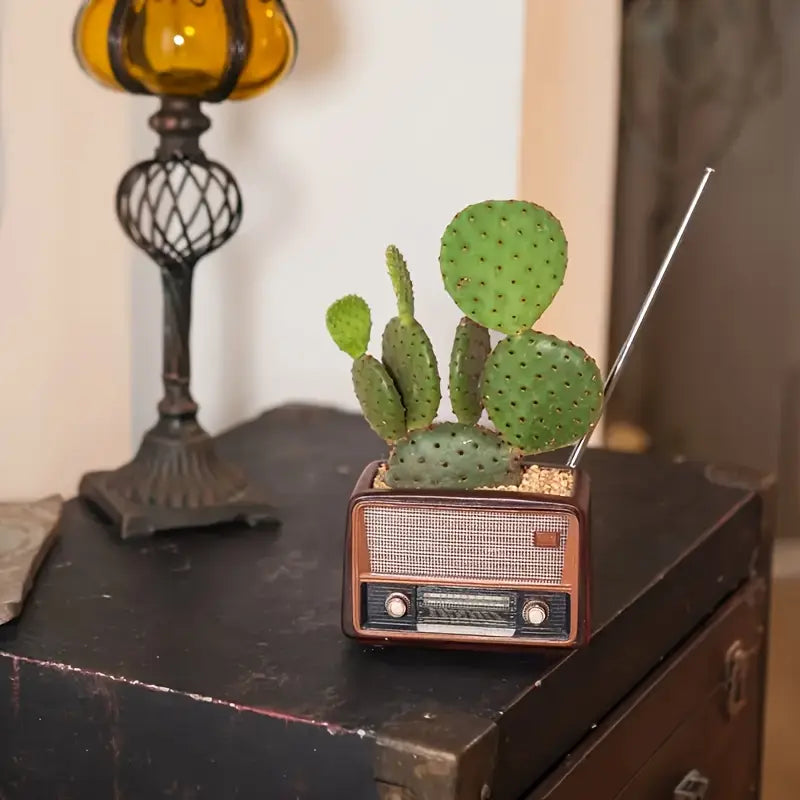 Vintage Radio Planter with Shaped pot plant holder/planter. Plastic resin in a gothic alternative style.