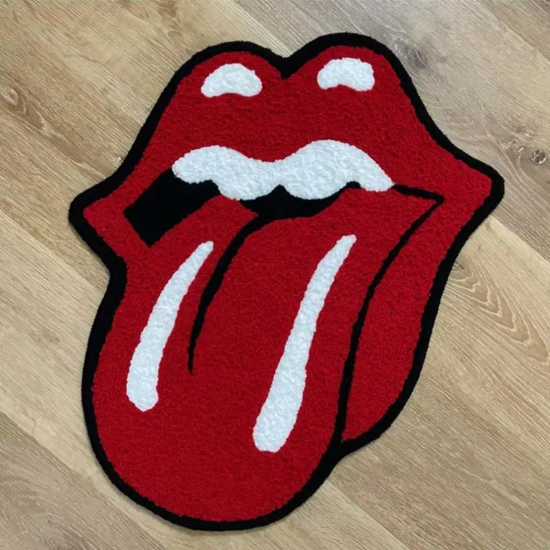 The Rolling Stones Rug with A polyester band logo shaped rug. Measures x . Velvet feel. Machine washable in a gothic alternative .