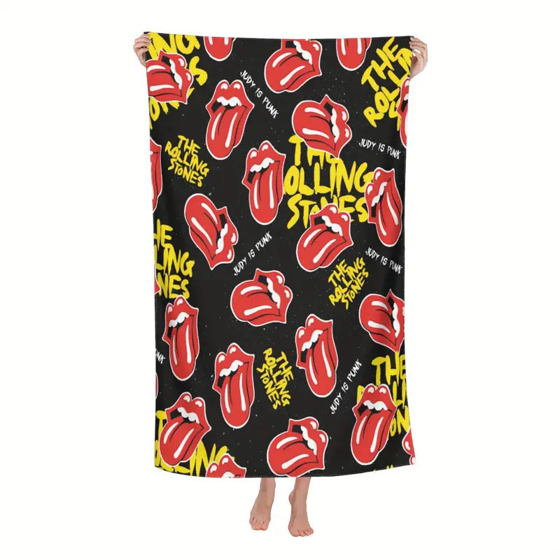 The Rolling Stones Beach Towel with A microfiber beach towel with band print.�� Soft to the touch and quick drying. Measures in a.