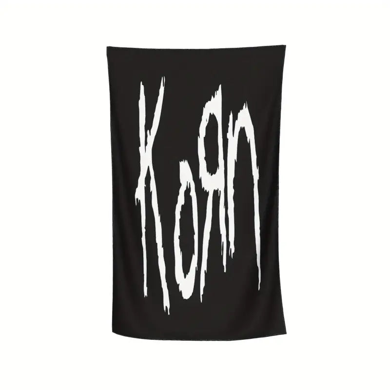 Korn Beach Towel with A microfiber beach towel with band print.�� Soft to the touch and quick drying. Measures in a gothic altern.