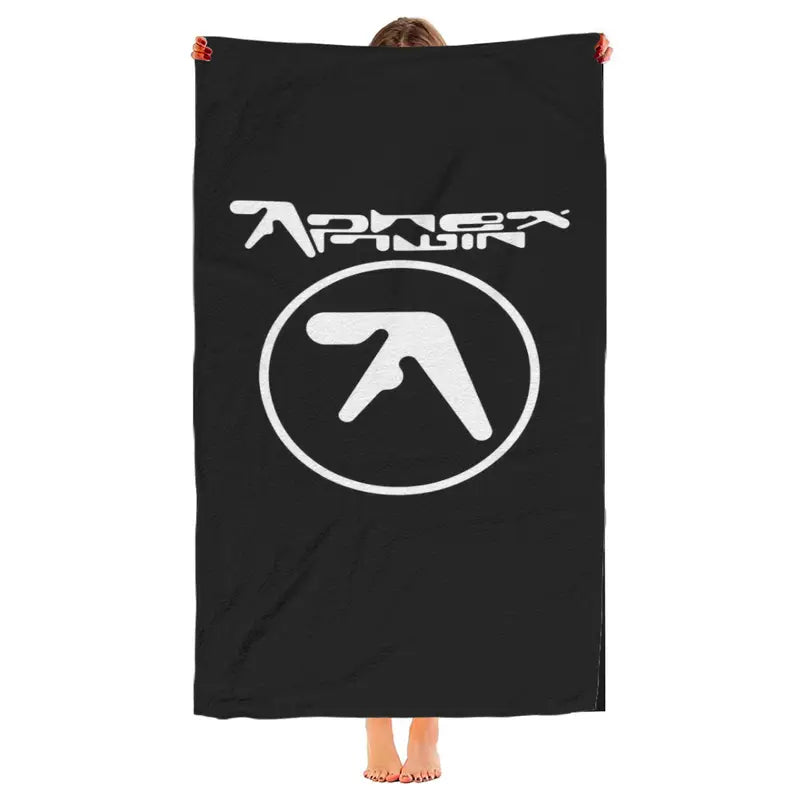 Aphex Twin Beach Towel with A microfiber beach towel with band print.�� Soft to the touch and quick drying. Measures in a gothic .