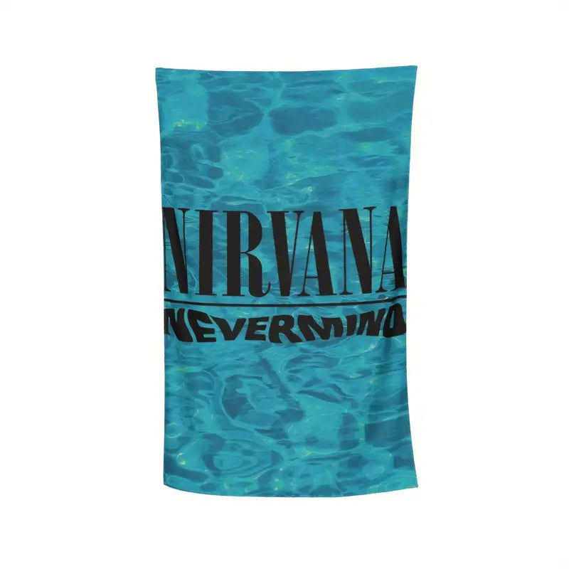 Nirvana Nevermind Beach Towel with A microfiber beach towel with band print.�� Soft to the touch and quick drying. Measures in a .