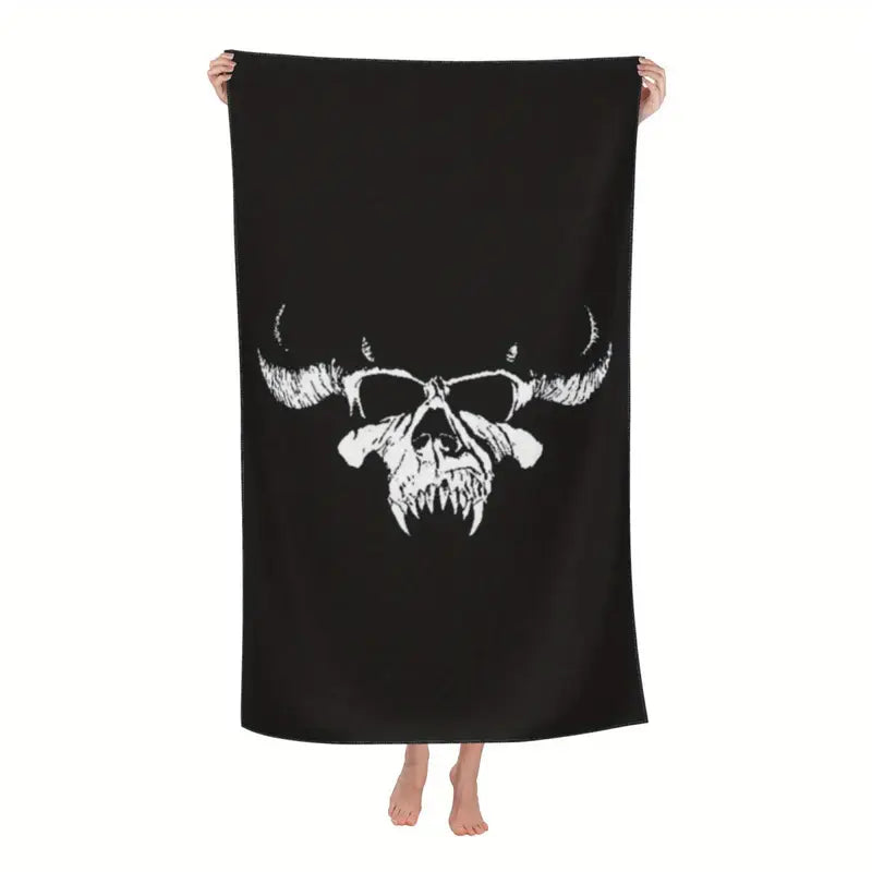 Danzig Beach Towel with A microfiber beach towel with band print.�� Soft to the touch and quick drying. Measures in a gothic alte.