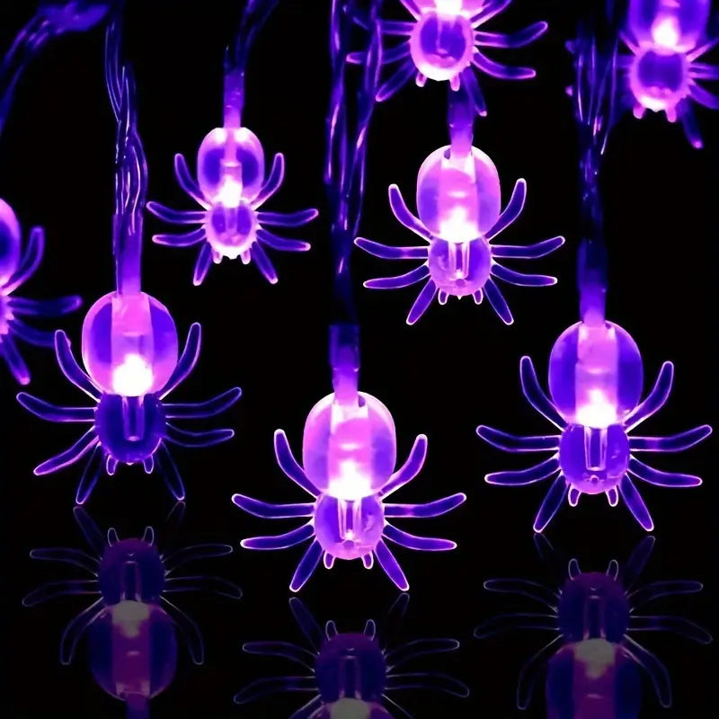 Purple Spider String Lights with Purple spider LED string lights. AA battery operated (not included) in a gothic alternative styl.